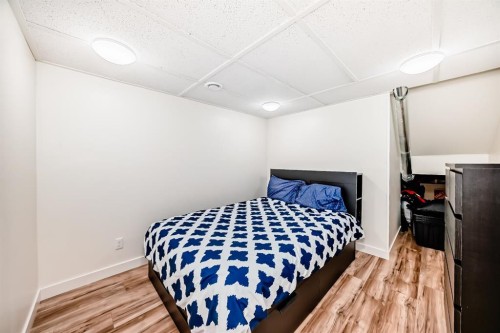 612 Montgomery Close Se, High River, AB - Indoor Photo Showing Bedroom