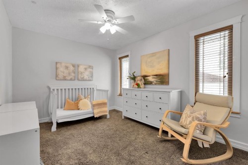 4712 Grove Hill Road Sw, Calgary, AB - Indoor Photo Showing Bedroom