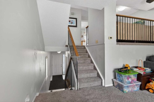 53 Millrise Lane Sw, Calgary, AB - Indoor Photo Showing Other Room