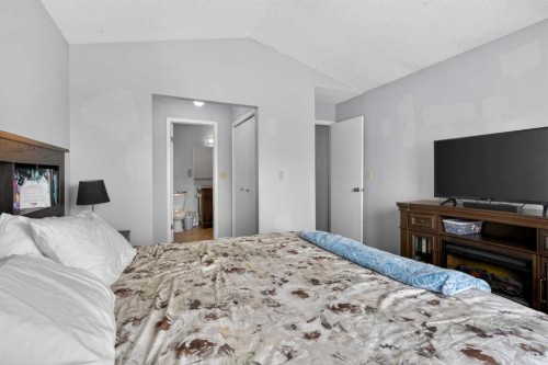 53 Millrise Lane Sw, Calgary, AB - Indoor Photo Showing Bedroom
