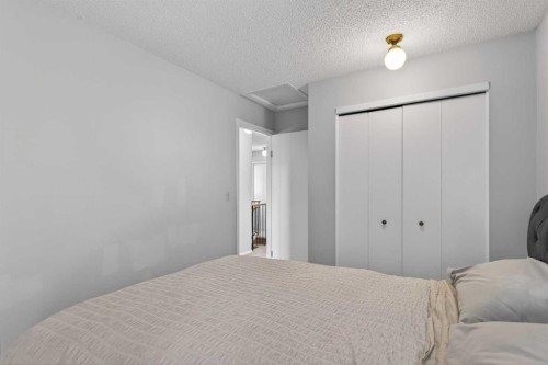 53 Millrise Lane Sw, Calgary, AB - Indoor Photo Showing Bedroom