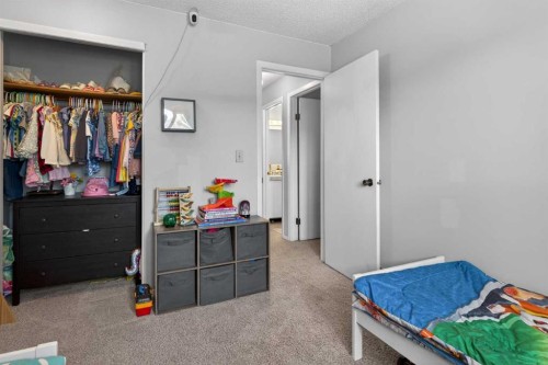 53 Millrise Lane Sw, Calgary, AB - Indoor Photo Showing Bedroom