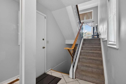 53 Millrise Lane Sw, Calgary, AB - Indoor Photo Showing Other Room