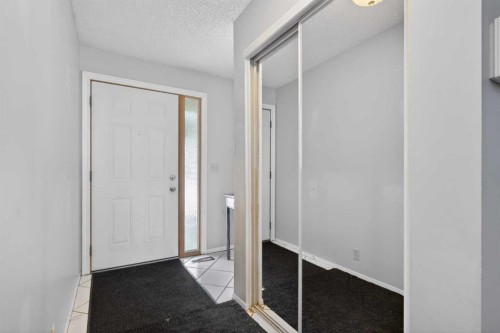 53 Millrise Lane Sw, Calgary, AB - Indoor Photo Showing Other Room