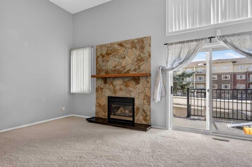 53 Millrise Lane Sw, Calgary, AB - Indoor With Fireplace