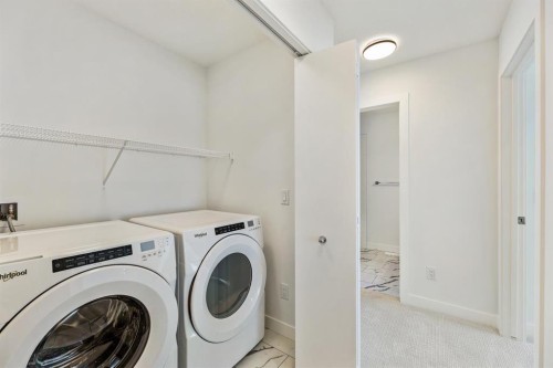 124-1862 Cornerstone Boulevard Ne, Calgary, AB - Indoor Photo Showing Laundry Room