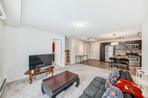 4308-279 Copperpond Common Se, Calgary, AB - Indoor Photo Showing Living Room