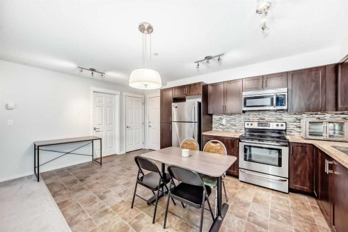 4308-279 Copperpond Common Se, Calgary, AB - Indoor Photo Showing Kitchen With Upgraded Kitchen