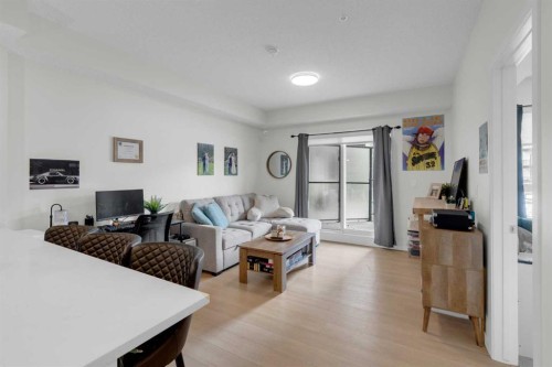 2106-33 Carringham Gate Nw, Calgary, AB - Indoor Photo Showing Living Room