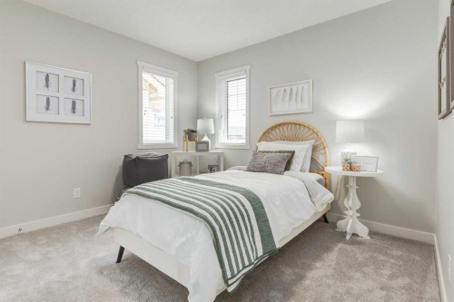 39 Versant Rise Sw, Calgary, AB - Indoor Photo Showing Bedroom