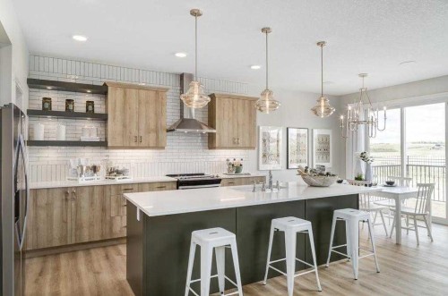 39 Versant Rise Sw, Calgary, AB - Indoor Photo Showing Kitchen With Upgraded Kitchen
