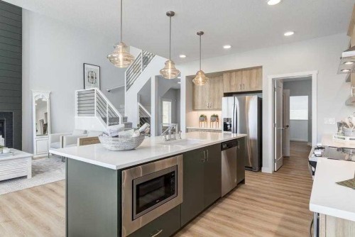 39 Versant Rise Sw, Calgary, AB - Indoor Photo Showing Kitchen With Upgraded Kitchen