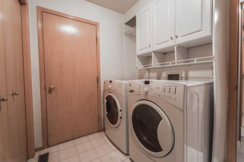 135 Canterbury Court Sw, Calgary, AB - Indoor Photo Showing Laundry Room