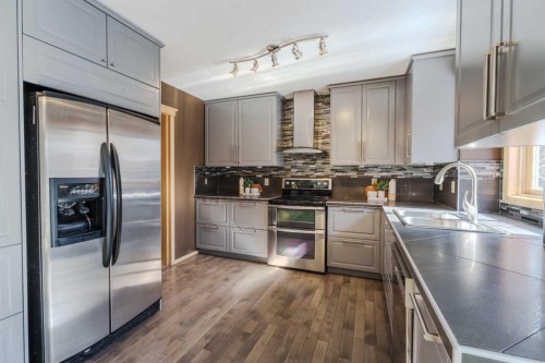 135 Canterbury Court Sw, Calgary, AB - Indoor Photo Showing Kitchen With Stainless Steel Kitchen With Upgraded Kitchen
