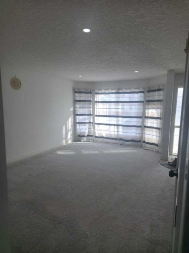 210 Saddlebrook Way Ne, Calgary, AB - Indoor Photo Showing Other Room