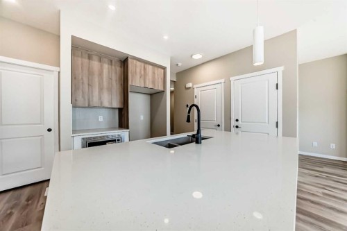 1085 Sawgrass Link Nw, Airdrie, AB - Indoor Photo Showing Kitchen With Double Sink