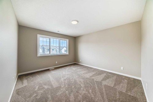 1085 Sawgrass Link Nw, Airdrie, AB - Indoor Photo Showing Other Room