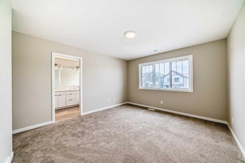 1085 Sawgrass Link Nw, Airdrie, AB - Indoor Photo Showing Other Room