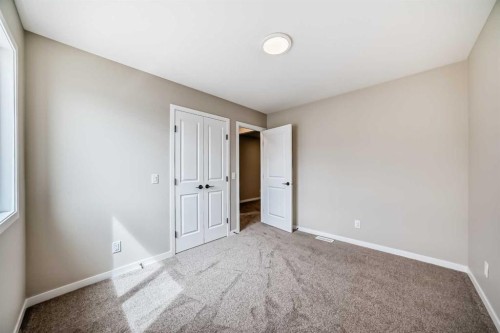 1085 Sawgrass Link Nw, Airdrie, AB - Indoor Photo Showing Other Room