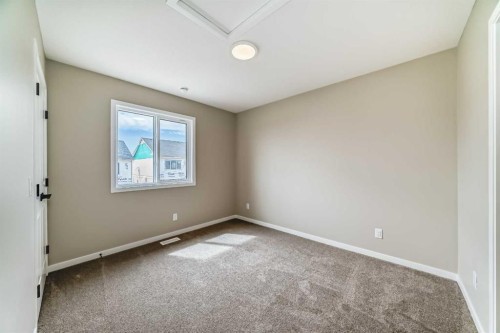 1085 Sawgrass Link Nw, Airdrie, AB - Indoor Photo Showing Other Room