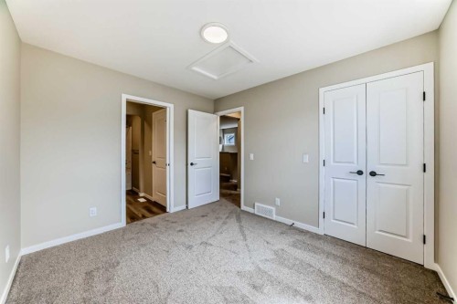 1085 Sawgrass Link Nw, Airdrie, AB - Indoor Photo Showing Other Room