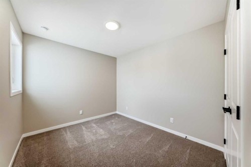 1085 Sawgrass Link Nw, Airdrie, AB - Indoor Photo Showing Other Room