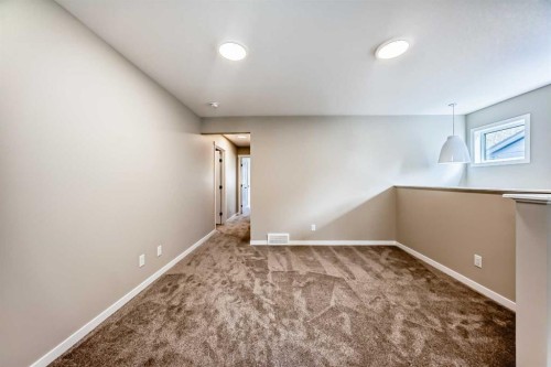 1085 Sawgrass Link Nw, Airdrie, AB - Indoor Photo Showing Other Room