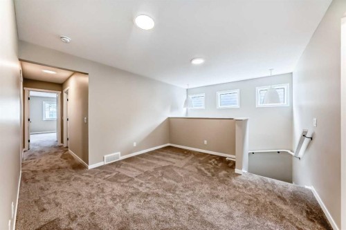 1085 Sawgrass Link Nw, Airdrie, AB - Indoor Photo Showing Other Room