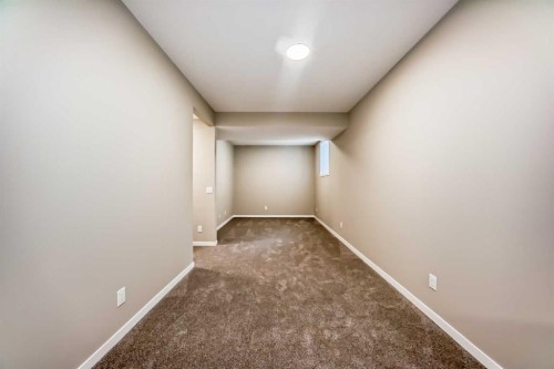 1085 Sawgrass Link Nw, Airdrie, AB - Indoor Photo Showing Other Room