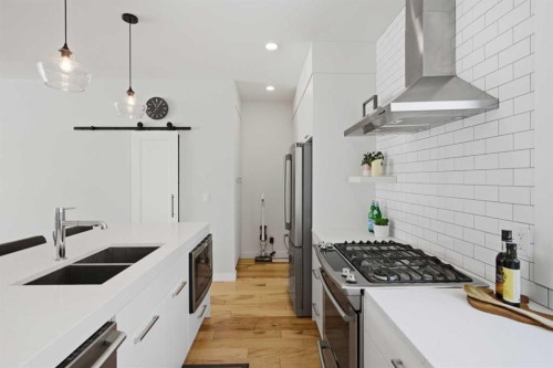 3012 Parkdale Boulevard Nw, Calgary, AB - Indoor Photo Showing Kitchen With Stainless Steel Kitchen With Double Sink With Upgraded Kitchen