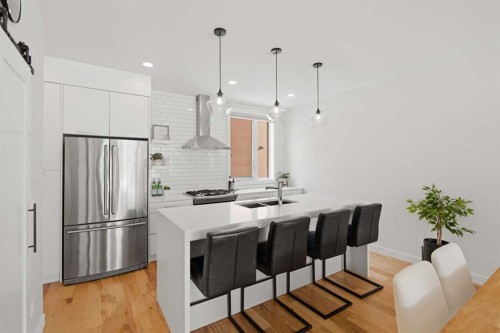 3012 Parkdale Boulevard Nw, Calgary, AB - Indoor Photo Showing Kitchen With Stainless Steel Kitchen With Double Sink With Upgraded Kitchen
