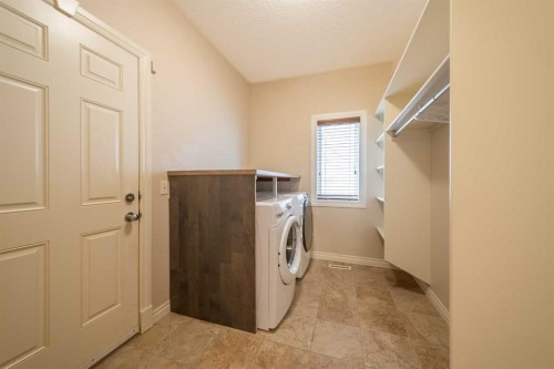 107 Panatella Close Nw, Calgary, AB - Indoor Photo Showing Laundry Room