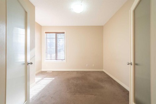 107 Panatella Close Nw, Calgary, AB - Indoor Photo Showing Other Room