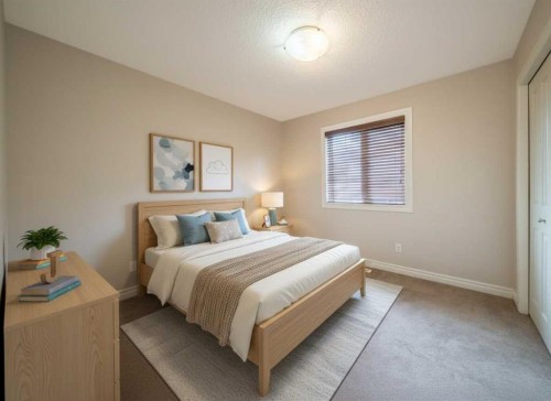 107 Panatella Close Nw, Calgary, AB - Indoor Photo Showing Bedroom