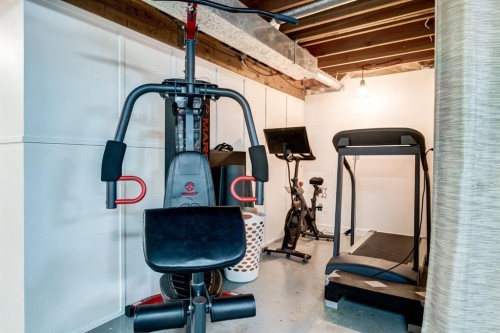 108 Westheights Close, Didsbury, AB - Indoor Photo Showing Gym Room