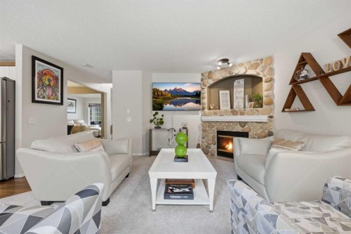 65 Millview Park Sw, Calgary, AB - Indoor Photo Showing Living Room With Fireplace