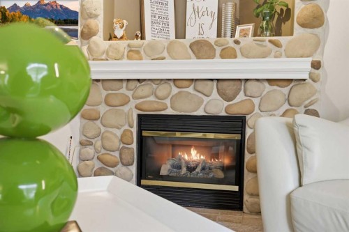 65 Millview Park Sw, Calgary, AB - Indoor Photo Showing Living Room With Fireplace