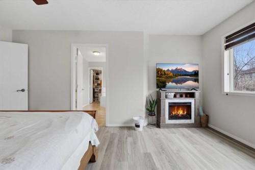 65 Millview Park Sw, Calgary, AB - Indoor Photo Showing Other Room With Fireplace