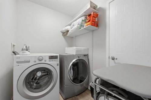 65 Millview Park Sw, Calgary, AB - Indoor Photo Showing Laundry Room