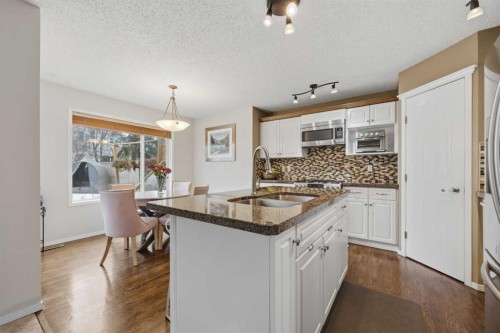 65 Millview Park Sw, Calgary, AB - Indoor Photo Showing Kitchen With Double Sink With Upgraded Kitchen