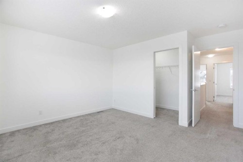 438 Copperstone Manor Se, Calgary, AB - Indoor Photo Showing Other Room