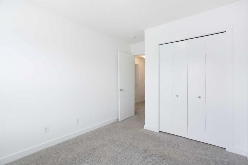 438 Copperstone Manor Se, Calgary, AB - Indoor Photo Showing Other Room