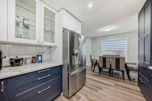 2-7 Westland Road, Okotoks, AB - Indoor Photo Showing Other Room