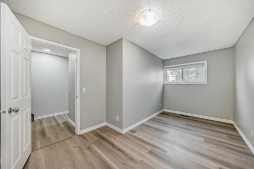 2-7 Westland Road, Okotoks, AB - Indoor Photo Showing Other Room