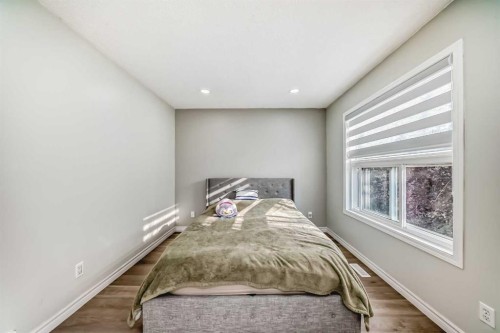 2-7 Westland Road, Okotoks, AB - Indoor Photo Showing Bedroom