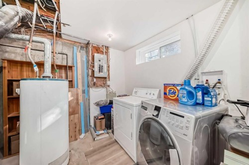 2-7 Westland Road, Okotoks, AB - Indoor Photo Showing Laundry Room
