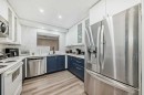 2-7 Westland Road, Okotoks, AB  - Indoor Photo Showing Kitchen With Stainless Steel Kitchen 