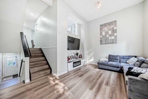 2-7 Westland Road, Okotoks, AB - Indoor Photo Showing Living Room