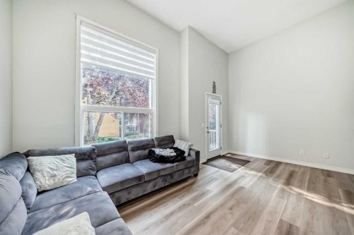 2-7 Westland Road, Okotoks, AB - Indoor Photo Showing Living Room