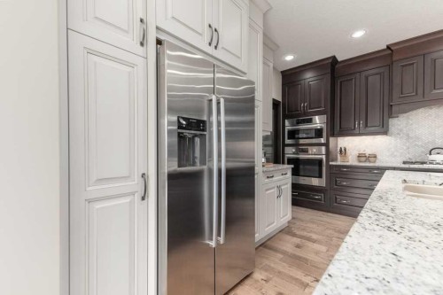 84 Aspen Summit Circle Sw, Calgary, AB - Indoor Photo Showing Kitchen With Upgraded Kitchen